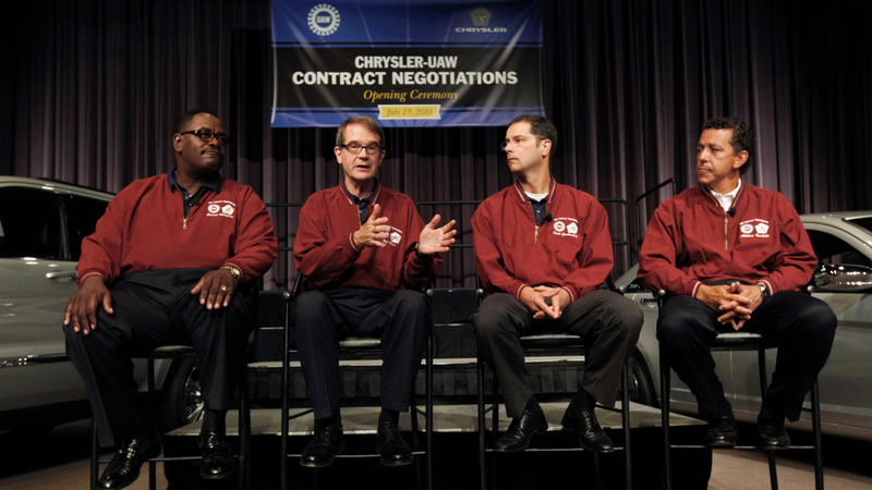 Holiefield, far left, and Iacobelli, far right, in 2011